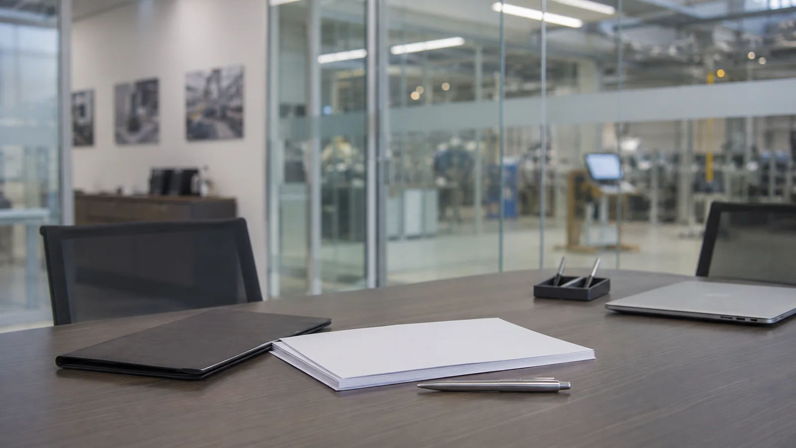 Corporate meeting room and business documents in an industrial company office